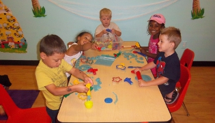 Kids playing with Play-Doh